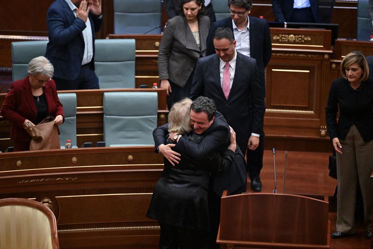 Kosovo Prime Minister Albin Kurti congratulates the newly elected as President of Kosovo Justina Pula during an extraordinary session in Pristina on October 7, 2026. (AFP Photo)