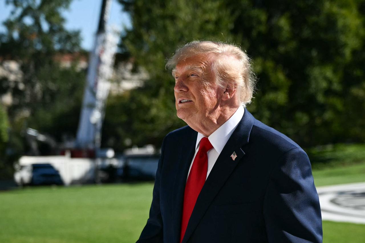 US President Donald Trump looks toward visitors before walking to Marine One on the South Lawn of the White House in Washington, DC, on October 6, 2026. (AFP Photo)