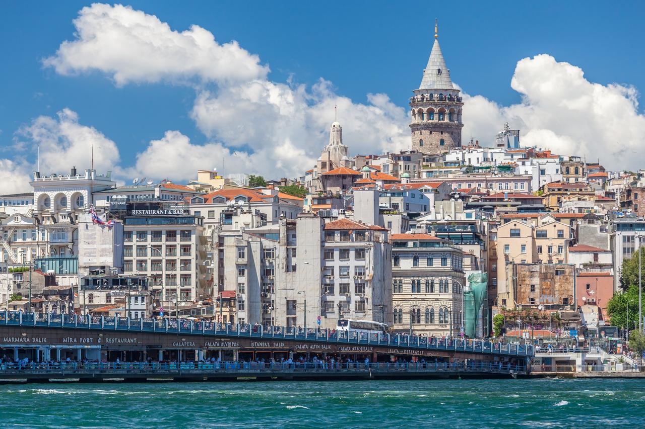 Galata Tower rises above the historic Beyoglu district skyline in Istanbul, Türkiye, July 14, 2022. (Adobe Stock Photo)