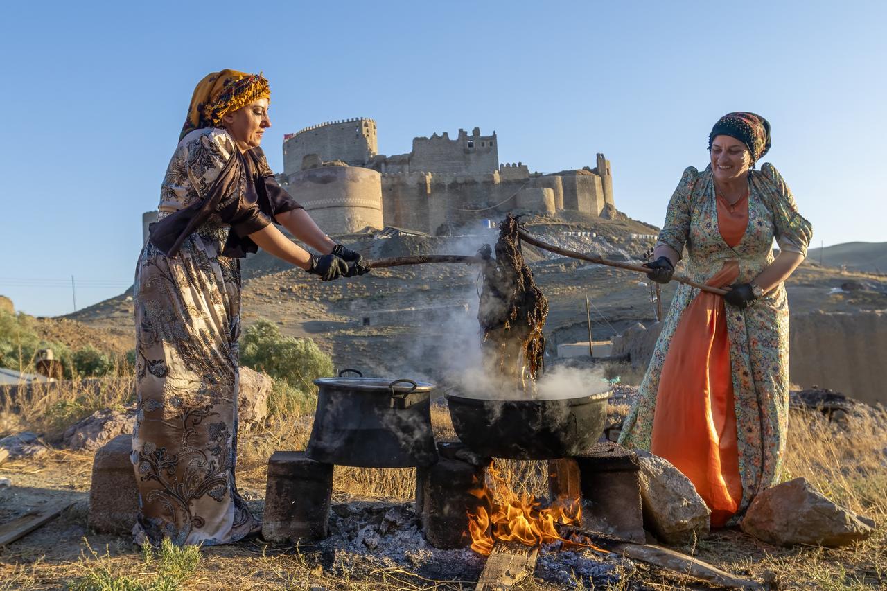 Women in Van, eastern Türkiye, carry out different stages of traditional kilim production, from preparing and naturally dyeing sheep wool to spinning the yarn and weaving colorful motifs by hand on wooden looms. (AA Photo)