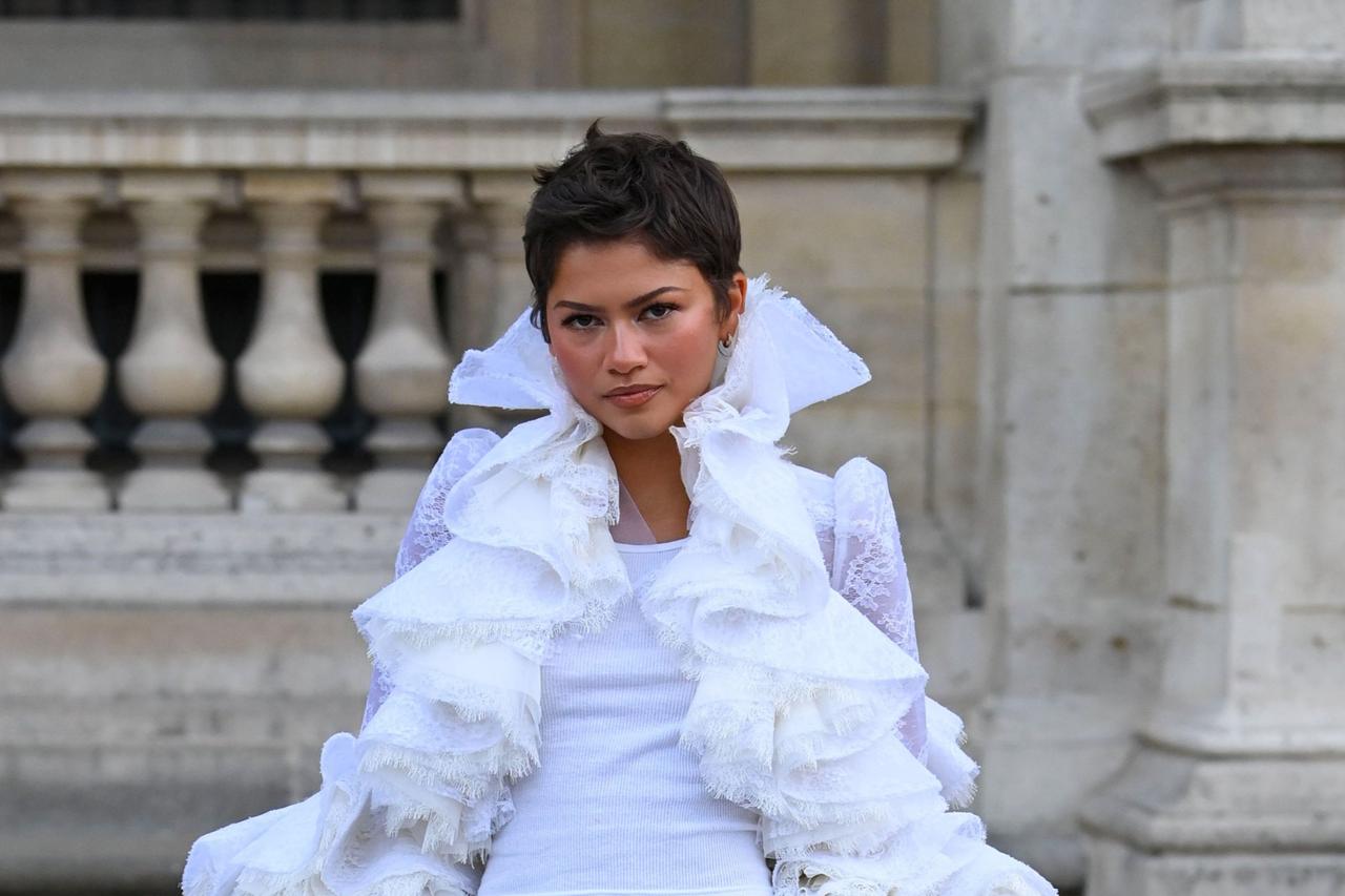 Zendaya stays seated for France's first lady at Paris show, drawing mixed reaction