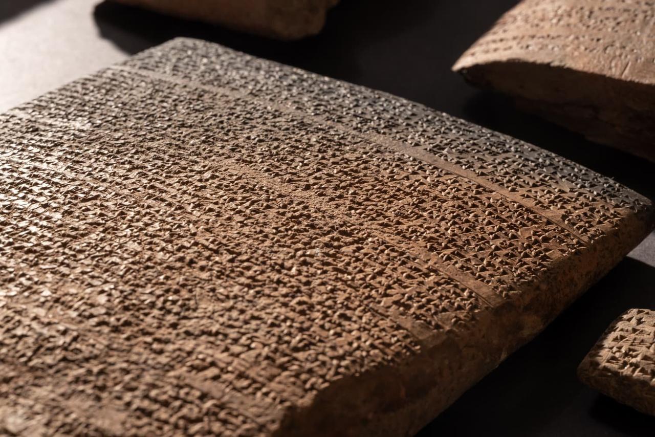 Detailed cuneiform inscriptions cover the surface of an ancient clay tablet, highlighting the written records preserved from the Hittite civilization. (Photo via X/@mehmetnuriersoy)