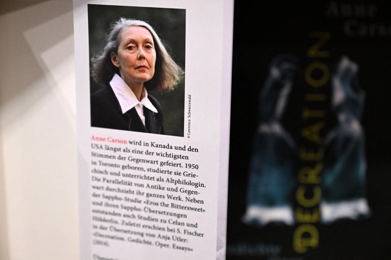A book by Canadian writer Anne Carson is on display at the S. Fischer publishing house's booth at the 78th Frankfurt Book Fair, on Oct. 8, 2026. (AFP Photo)