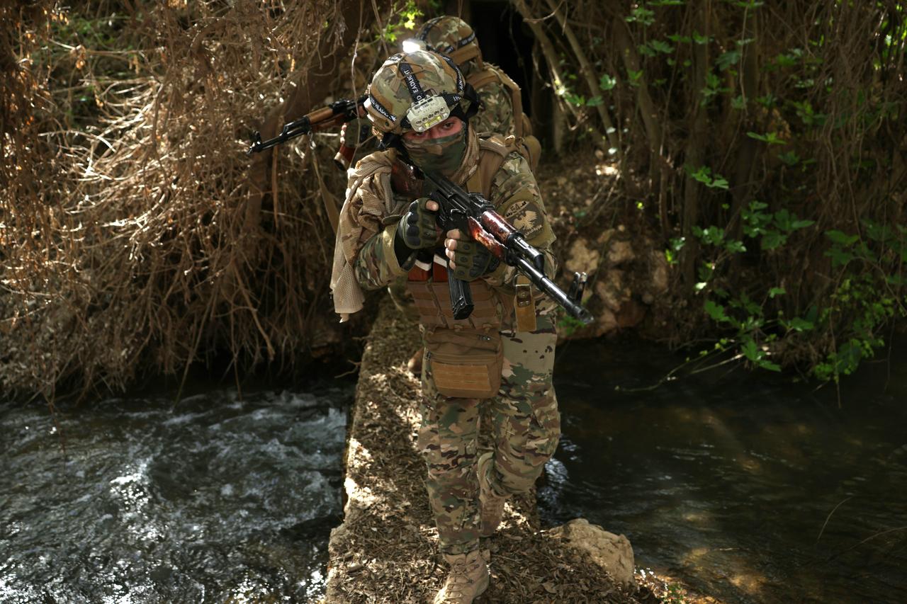Syrian army soldiers patrol along the Syrian–Lebanese border in the rural area of Al Qusayr on April 1, 2026. (AFP Photo)
