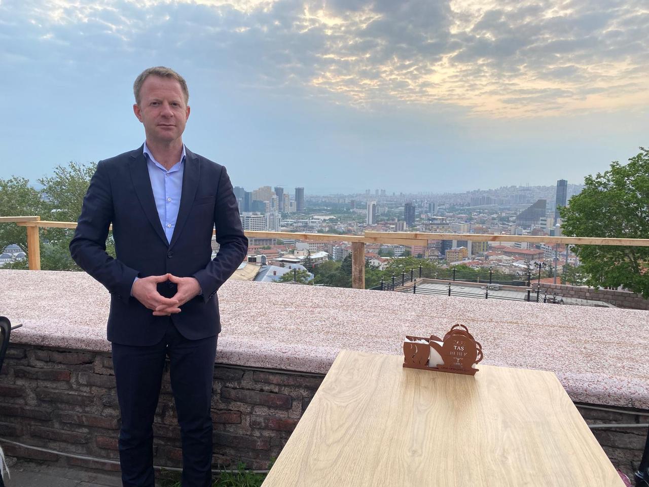 A publishing industry representative poses for a photo during an interview on artificial intelligence and the publishing sector in Türkiye, Oct. 9, 2026. (AA Photo)
