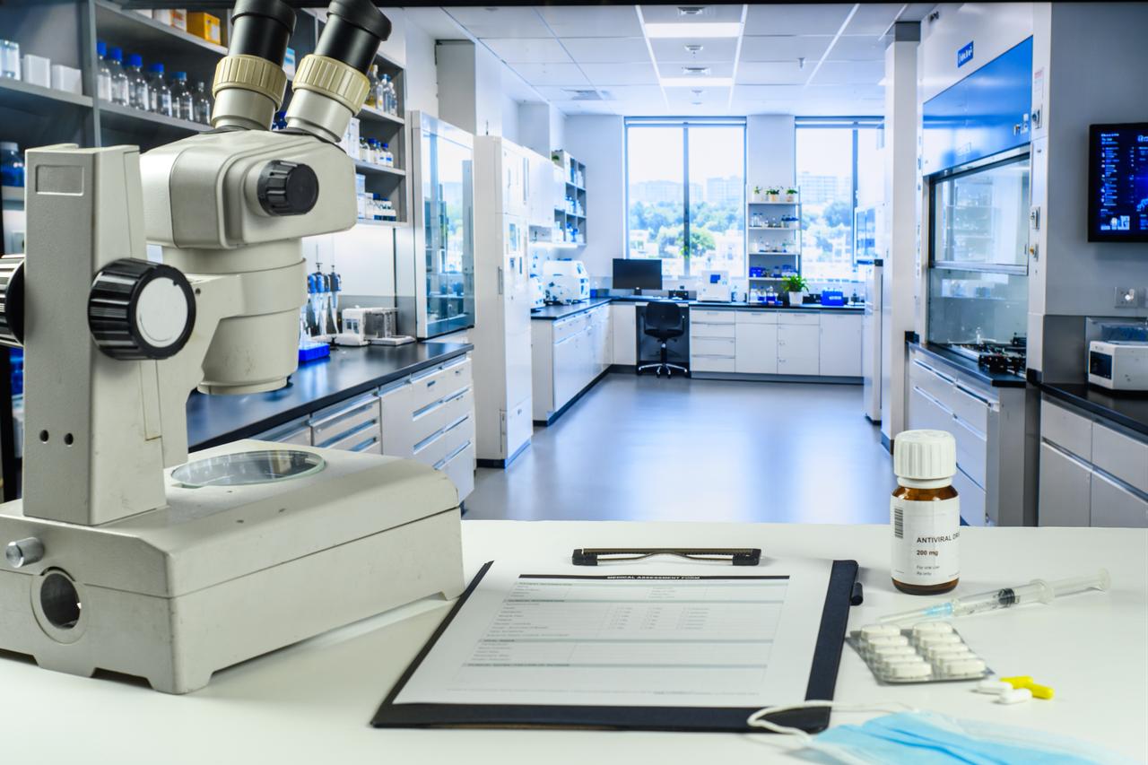 A medical laboratory is equipped with microscopes, medication and testing materials. (Adobe Stock Photo)