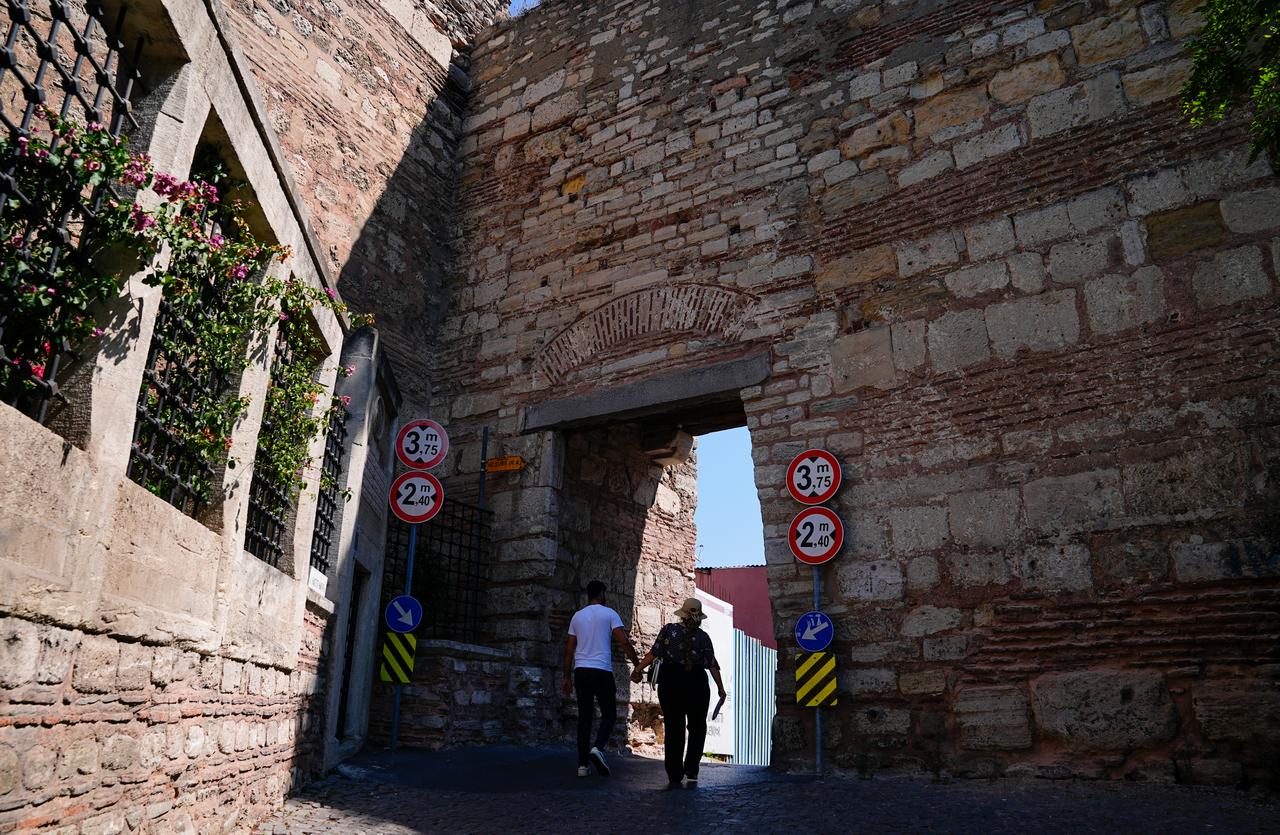 Visitors walk through Egrikapi, one of the historic gateways in Istanbul’s land walls, in Istanbul, Türkiye, Oct. 9, 2026. (AA Photo)