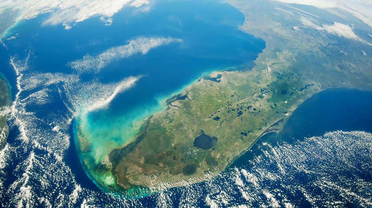 A satellite view shows Florida and surrounding coastal waters from space. (Adobe Stock Photo)