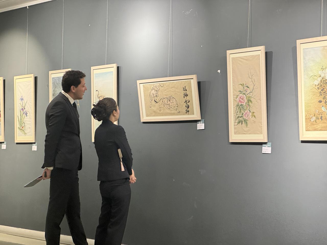 Visitors examine Japanese artworks at an exhibition held as part of Japan Week 2026 in Istanbul, Türkiye, Oct. 8, 2026. (AA Photo)