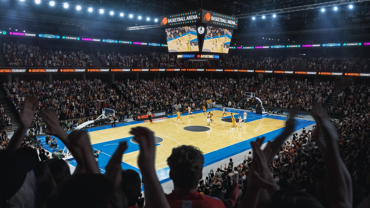 Fans watch a basketball game inside a packed indoor arena, illustrating professional basketball competition and spectator interest. (Adobe Stock Photo)