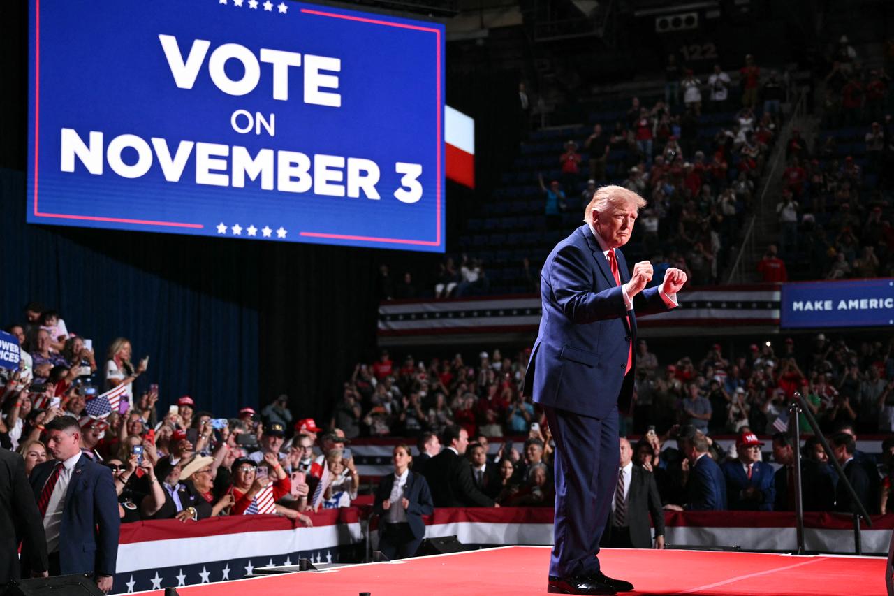 US President Donald Trump dances during a campaign rally at the Freeman Coliseum in San Antonio, Texas, on October 7, 2026. (AFP Photo)