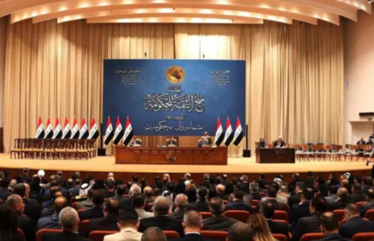 Iraqi deputies attend a session of the Iraqi Parliament in Baghdad, Iraq ( AFP Photo )