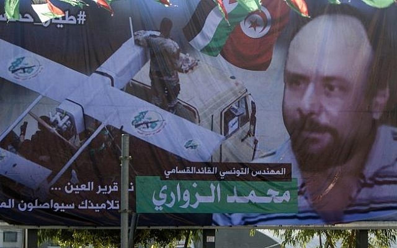 A picture taken on December 20, 2016, in Gaza City shows a banner depicting a portrait of Mohamed Zouari, who was murdered in Tunisia on December 15, 2016. (AFP Photo)
