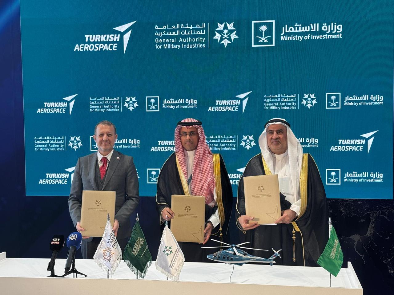 Turkish and Saudi officials during the MoU signing for the joint production of the Gokbey helicopter at the World Defense Show 2026, held in Riyadh, Saudi Arabia, Feb. 10, 2026. (AA Photo)