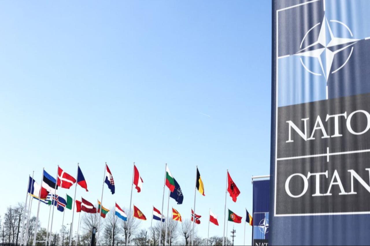 The national flags of countries member of the NATO fly outside the organisation headquarters in Brussels, Belgium on April 3, 2023. (AFP Photo)