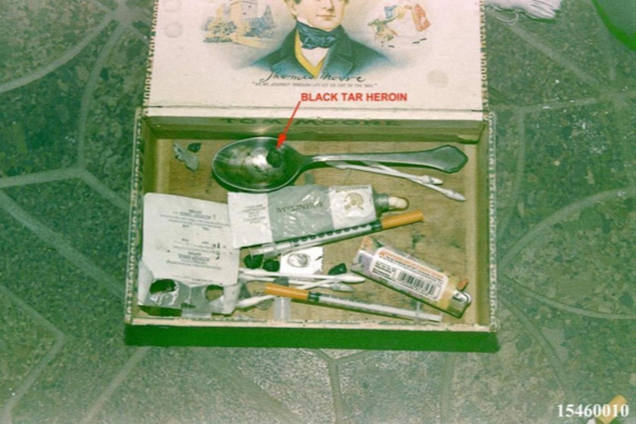 A cigar box containing heroin paraphernalia that investigators say was found at the scene of Kurt Cobain’s death. (Courtesy of whokilledkurt.org)