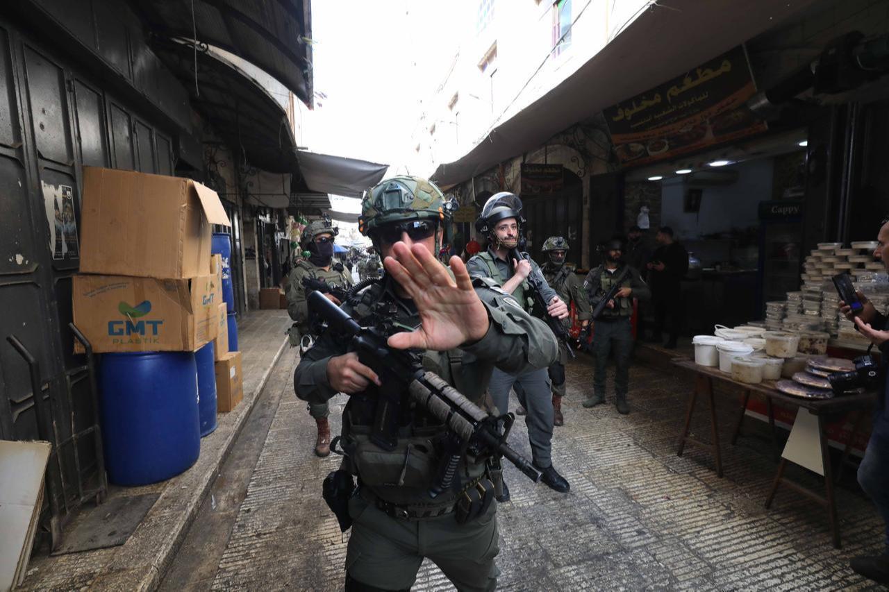 Israeli military forces intervene the press members during a raid on Old City, Nablus, West Bank on Feb. 11, 2026. (AA Photo)