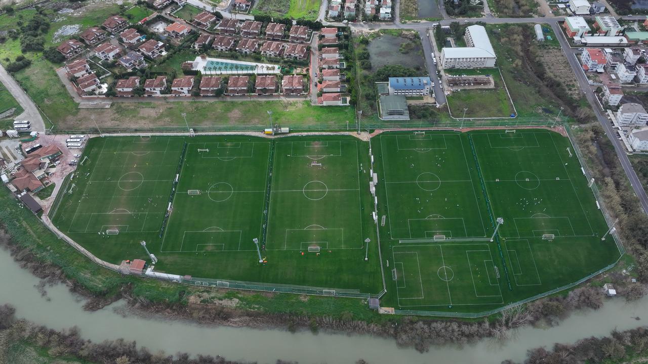 An aerial view shows multiple football training pitches at a sports complex hosting winter camps in Antalya, Türkiye, Feb. 12, 2026. (AA Photo)