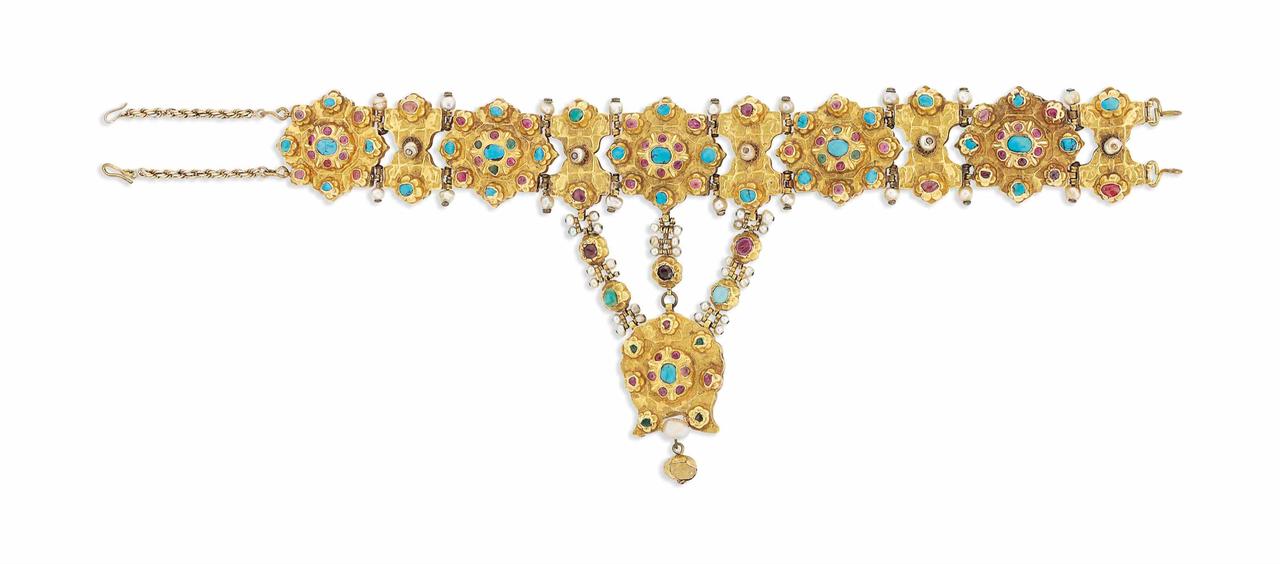 Seventeenth-century Ottoman necklace crafted in gold and adorned with pearls, turquoise, rubies, and emeralds. Source: Christie’s