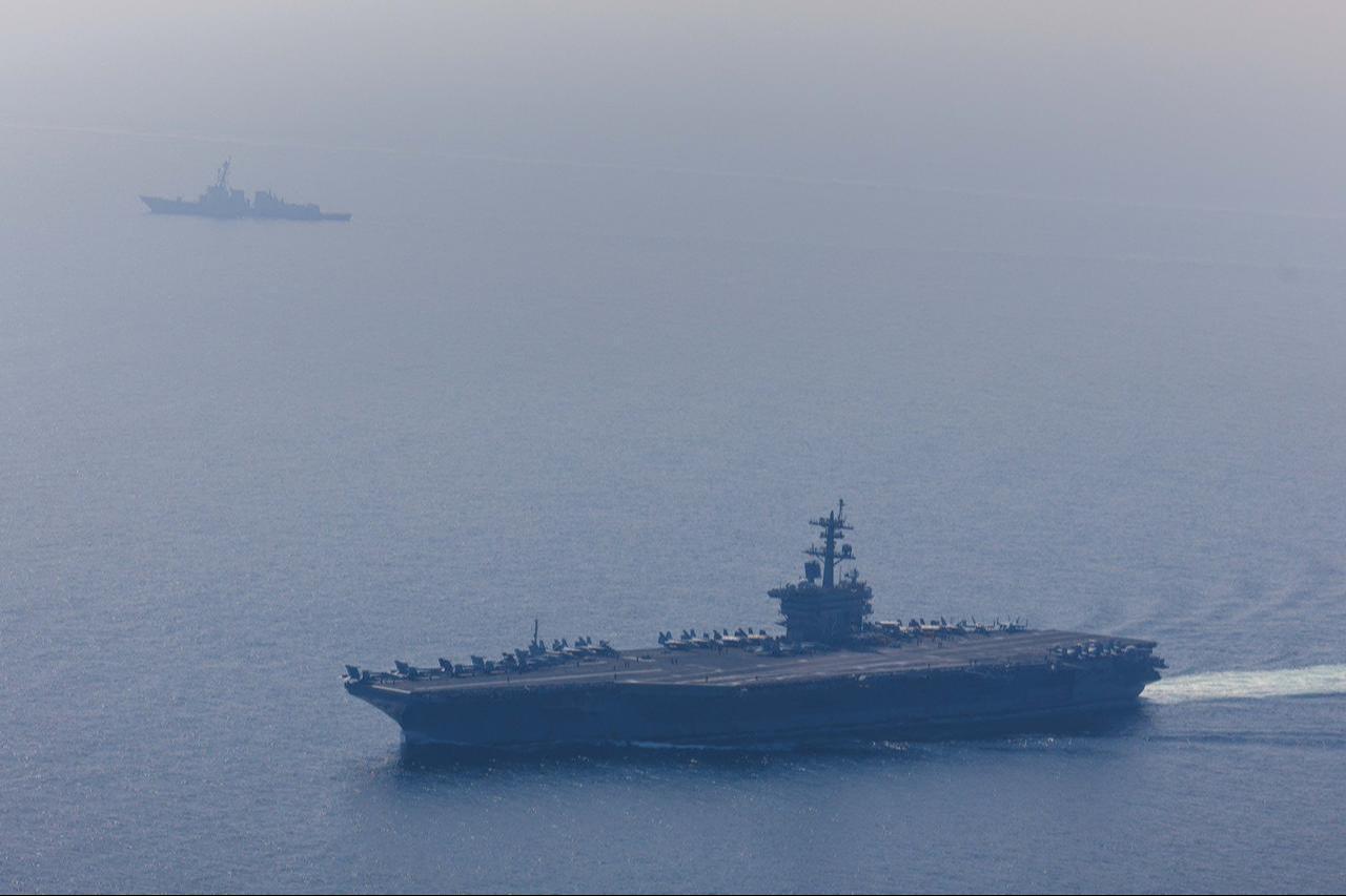 An aerial view of the USS Abraham Lincoln Carrier Strike Group while operating at the Arabian Sea in the Arabian Sea, on Feb. 6, 2026. (Photo via US CENTCOM/Handout)