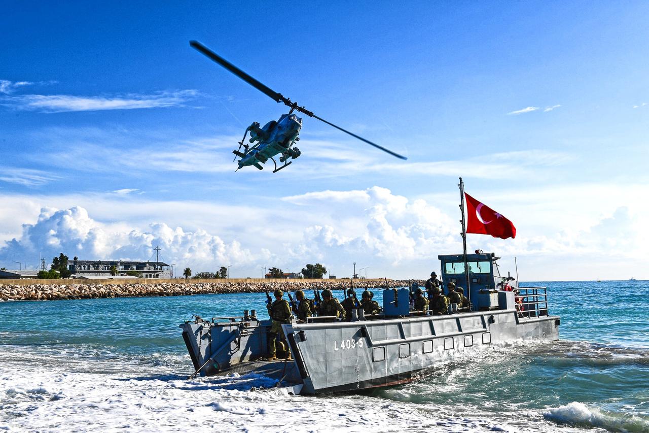 An AH-1 W Super Cobra helicopter of the Turkish Naval Forces Command at the Steadfast Dart 2026 exercise at an unspecified location, Feb 4, 2026. (Photo via X/@NCIAgency)
