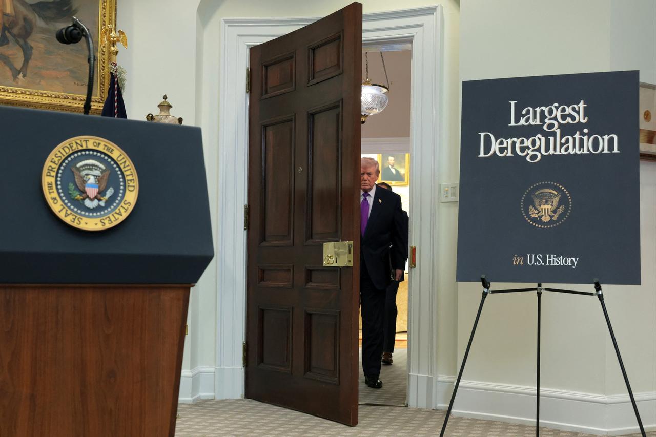 U.S. President Donald Trump attends an event to announce a rollback of the 2009 Endangerment Finding in the Roosevelt Room at the White House in Washington, DC, US on February 12, 2026. (AFP Photo)
