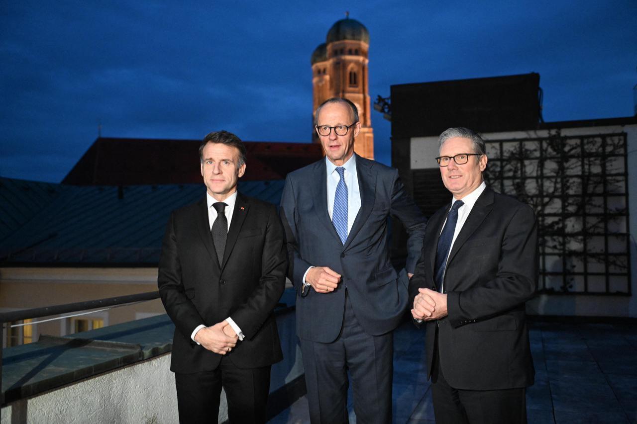 German Chancellor Friedrich Merz, France’s President Emmanuel Macron and Keir Starmer, Prime Minister of the United Kingdom stand together at the start of the E-3 meeting, during Munich Security Conference, Feb. 13, 2026 in Munich. (AFP Photo)