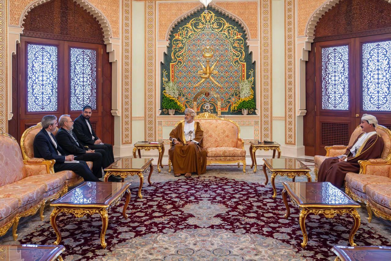 Secretary of the Supreme National Security Council Ali Larijani (2nd L) meeting with The Sultan of Oman, Haitham bin Tariq (2nd R) while Oman's Minister of the Royal Office Sultan bin Mohammed al-Numani (R) looks on in Muscat, Oman, Feb. 10, 2026. (Photo by Handout/Iran's Supreme National Security/AFP)