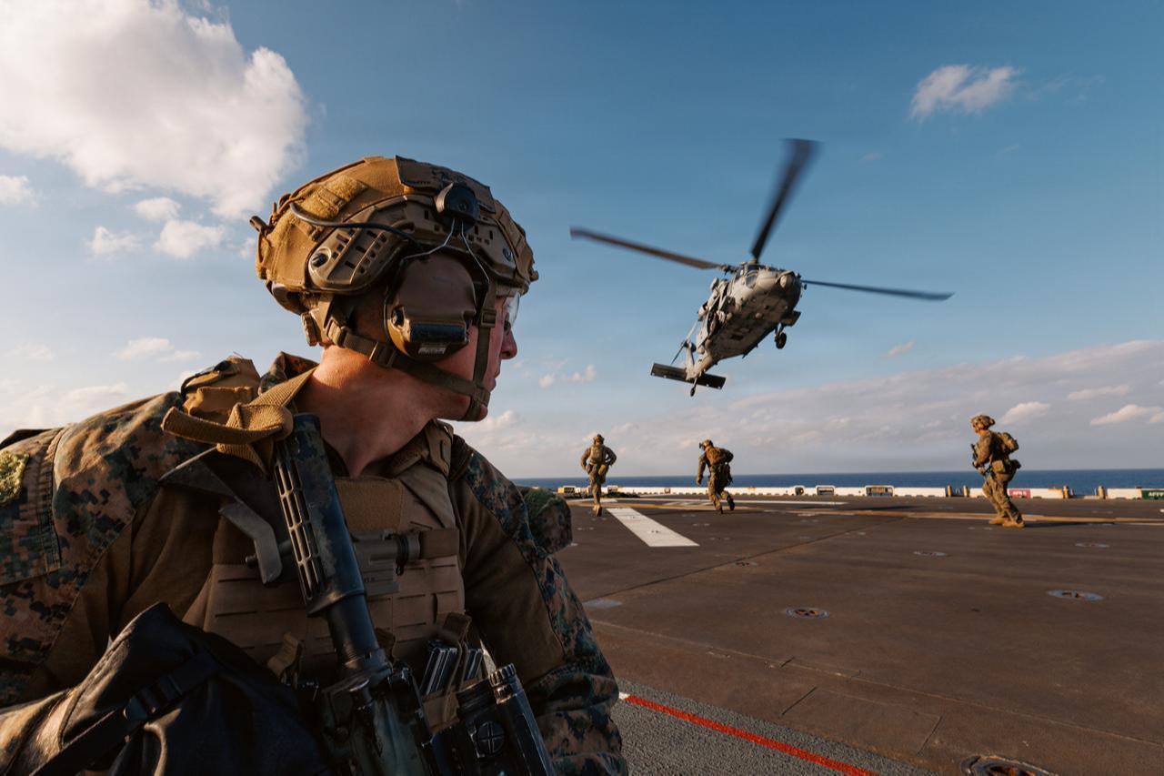 US Marines with Maritime Raid Force, 31st Marine Expeditionary Unit, fast rope off of an MH-60S Knighthawk, in the Philippine Sea, Jan. 30, 2026. (Photo via US Marine Corps)