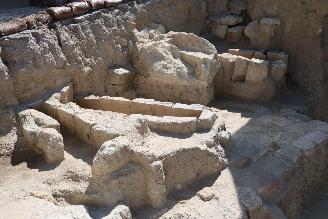 Archaeological remains uncovered during ongoing excavations reveal carved stone formations and structural features associated with underground living spaces in Cappadocia, Türkiye, Feb. 13, 2026. (IHA Photo)