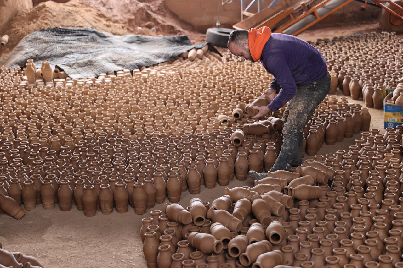 Finished pottery products lined up in the workshop. Türkiye, February 14, 2026. (AA Photo)