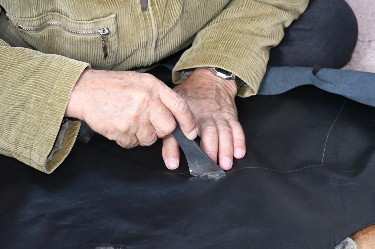 A craftsman shapes leather using traditional methods while continuing a family trade that artisans say is at risk of disappearing without new apprentices, Yozgat, Türkiye, Feb. 15, 2026. (IHA Photo)