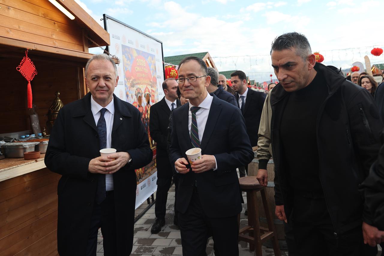 Deputy Minister of Culture and Tourism Gokhan Yazgi (left) and Jiang Xuebin (center), Ambassador of the People’s Republic of China to Ankara, toured the gastronomy street set up for the event by the Cappadocia Site Directorate in Goreme. Nevsehir, Türkiye, February 14, 2026. (AA Photo)