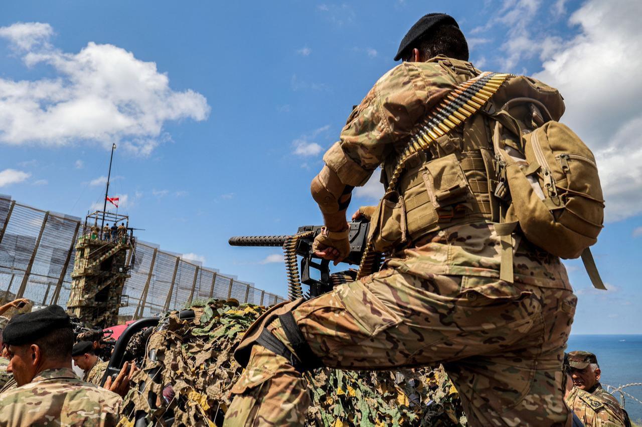 A Lebanese army soldier mans a machine gun turret near an observation tower overlooking the border area near Naqura in southern Lebanon, Aug. 8, 2023. (AFP Photo)