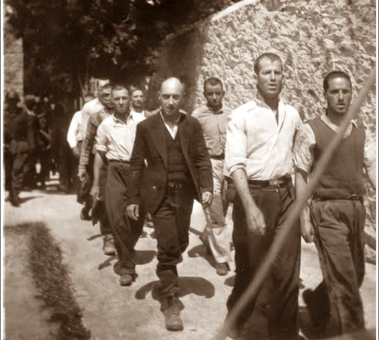 Greek detainees walk under guard toward the Kaisariani shooting range, Athens, Greece, May 1, 1944. (Photo via Instagram / @greece_at_ww2_archives)