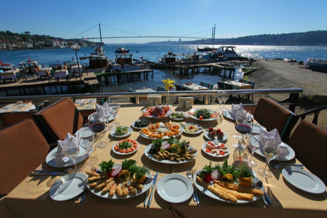 Turkish sea foods and appetizers on the restaurant table at Bosphorus in Istanbul, Türkiye. (Adobe Stock Photo)