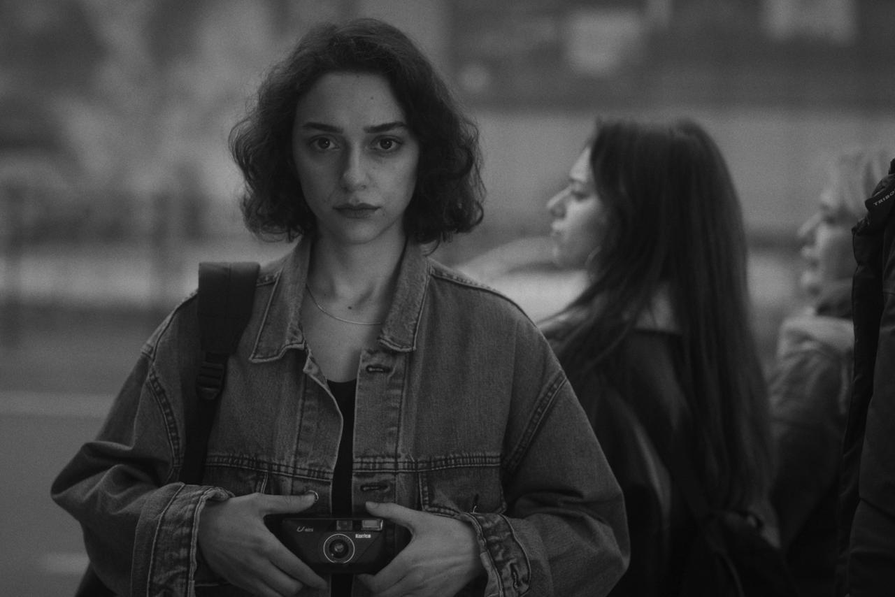 The young photographer confronts her uncertain future in a pivotal moment from the film. (Photo via Dump of Untitled Pieces production companies)