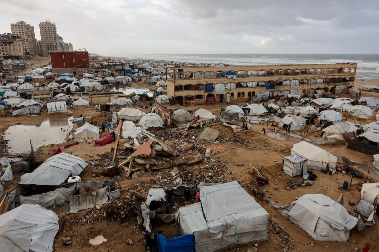 Tent shelters housing displaced Palestinian families along the shore in Gaza City as strong winter winds sweep the Palestinian enclave on Jan. 13, 2026. (AFP Photo)