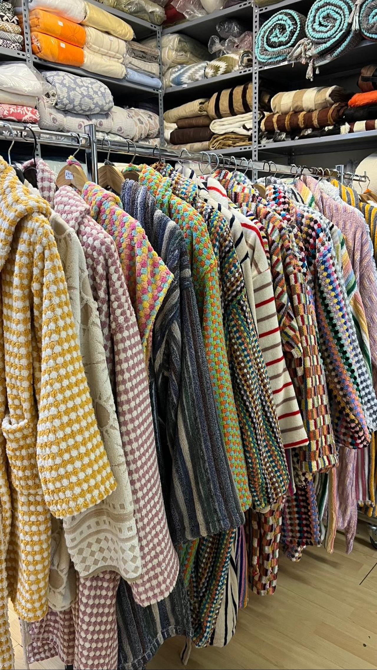 Collection of terry towels in various styles, designs, and colors. (Nour Dajani/Türkiye Today)