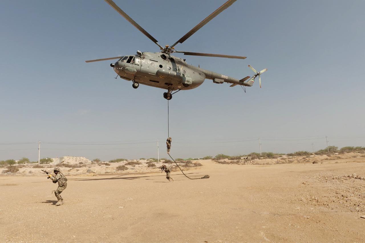 Members of the IRGC and navy taking part in a military exercise in the Gulf, February 16, 2026. (AFP Photo)