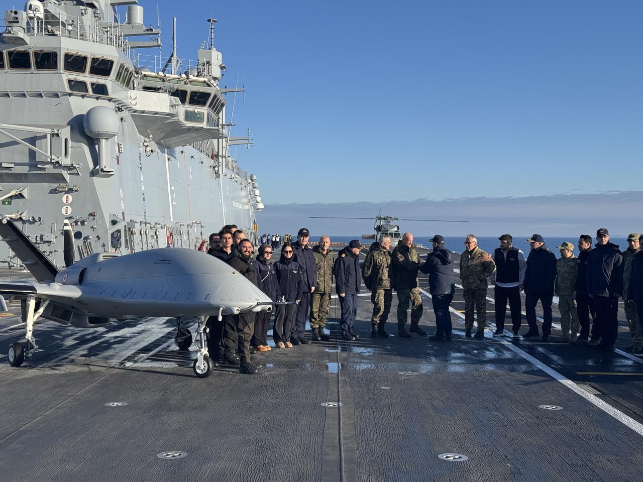 Commander of NATO Joint Forces Command Brunssum, General Ingo Gerhart and Turkish Navy Commander Admiral Ercument Tatlioglu pose for a photo after observing the Bayraktar TB3 UAV during “Steadfast Dart 2026” in Kiel, Germany, Feb. 18, 2026. (AA Photo)
