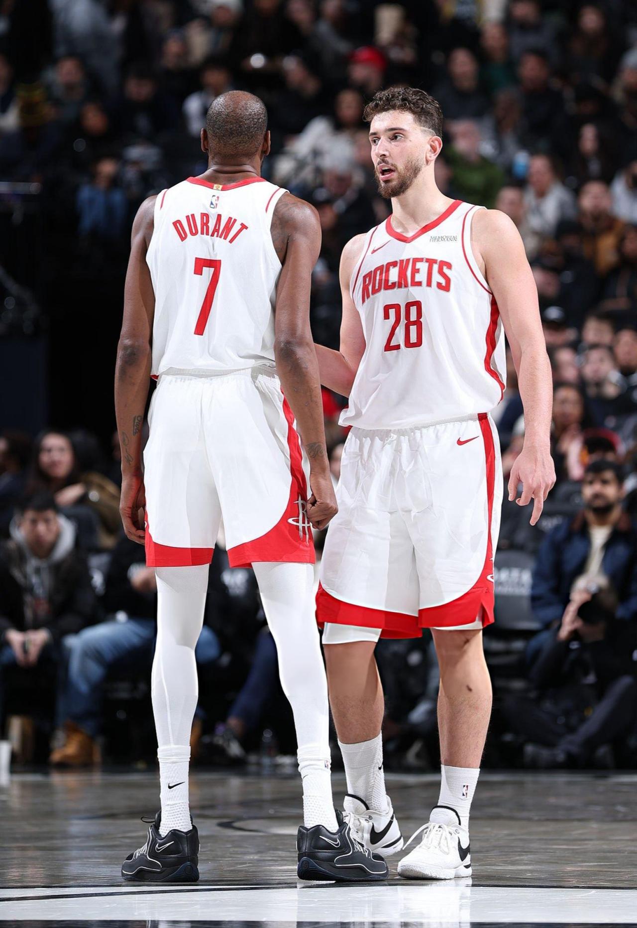 Kevin Durant #7 high fives Alperen Sengun #28 of the Houston Rockets during the first half against the Philadelphia 76ers at Xfinity Mobile Arena in Philadelphia, Pennsylvania, US, Jan. 22, 2026. (AFP Photo)