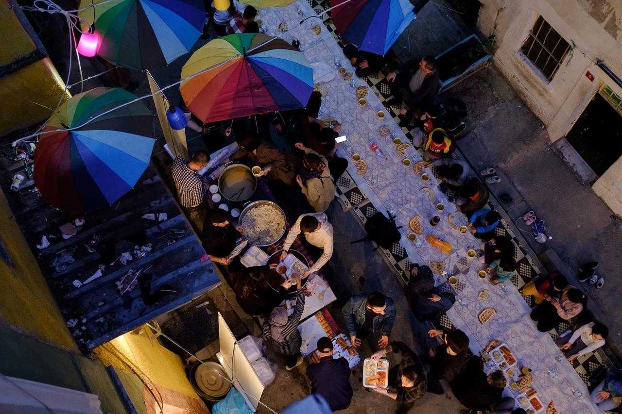 Residents partake in a street iftar in a neighborhood, in Istanbul, Türkiye, April 9, 2022. (AA Photo)
