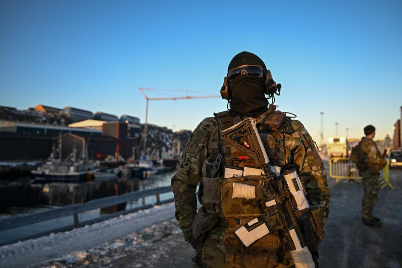 A Danish soldier stands at a checkpoint in the harbor of Nuuk, Greenland, on January 26, 2026. (AFP Photo)
