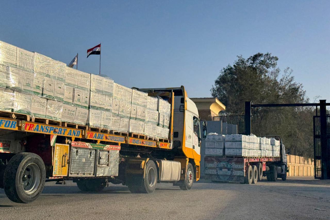 Humanitarian aid trucks enter through the Egyptian side of the Rafah border crossing with the Gaza Strip in northeastern Egypt on February 1, 2026. (AFP Photo)