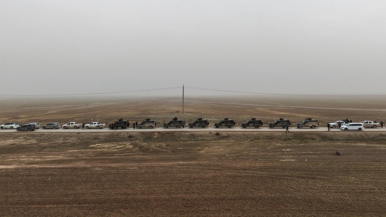 An aerial view shows a Syrian government forces military convoy driving along a road in the countryside near the northeastern Syrian city of Hasakah, Feb. 2, 2026. (AFP Photo)