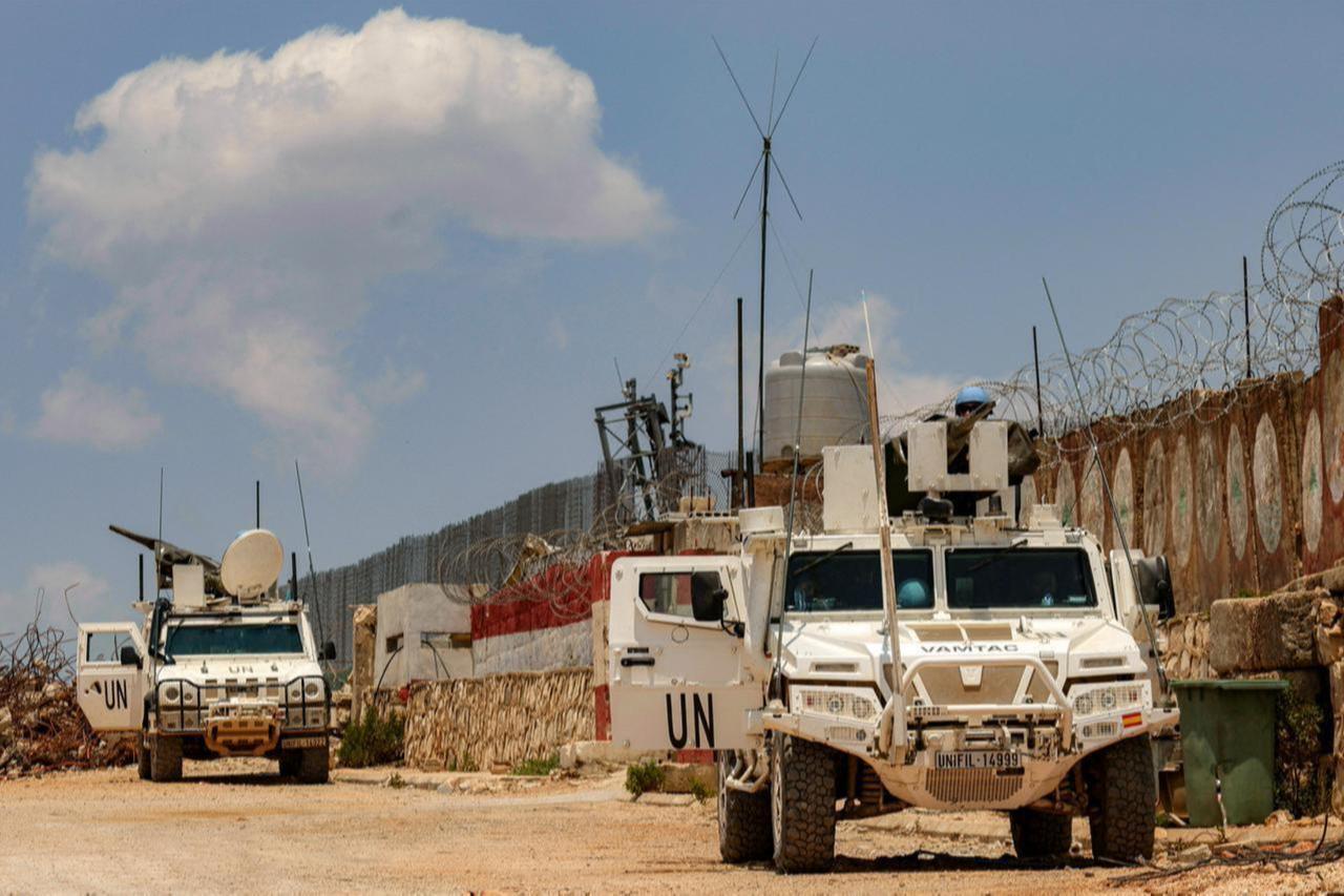 Peacekeepers of the United Nations Interim Force in Lebanon (UNIFIL) ride in armoured vehicles during a patrol along the border with Israel by the village of Kfar Kila in south Lebanon on June 4, 2025. (Photo by AFP)