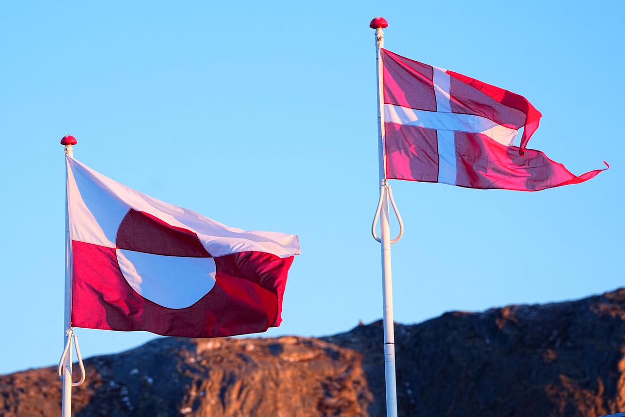 The Danish and the Greenlanic flag are seen during the arrival of the King of Denmark at the airport in Kangerlussuaq in Greenland, February 19, 2026. (AFP Photo)