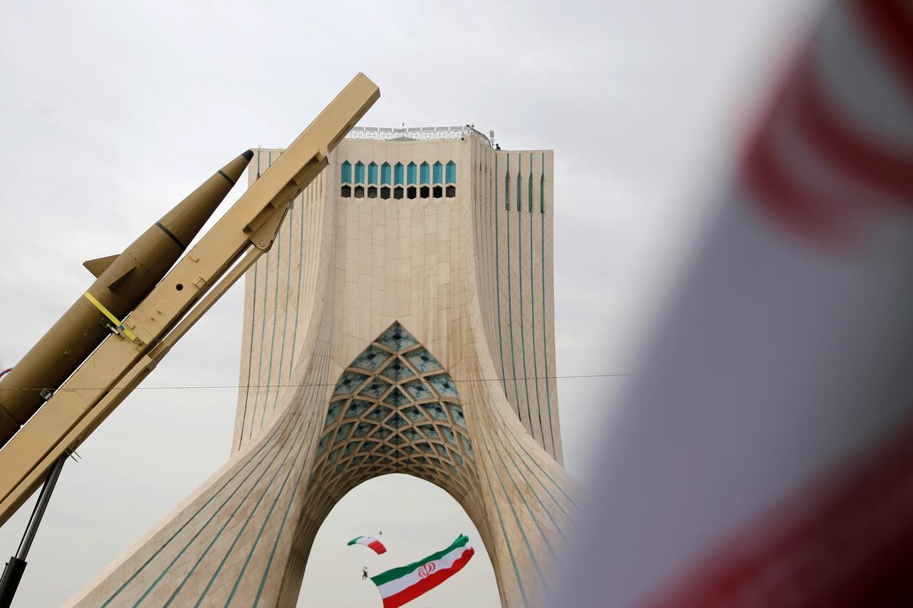 Missiles produced by Iran are displayed during a paramotor show featuring the Iranian flag during celebrations at Tehran’s Azadi Square in Tehran, Iran, Feb. 11, 2026. (AA Photo)