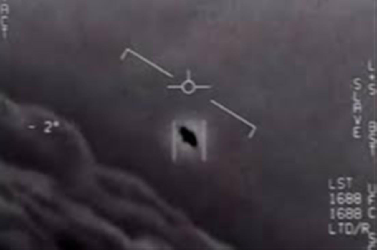 This screengrab, courtesy of the US Department of War, shows part of an unclassified video taken by Navy pilots showing interactions with "unidentified aerial phenomena," April 26, 2020. (AFP Photo)